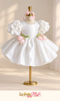 Grace Dress by La Petite Miss, white girls dress with pink tulip flowers and puff sleeves, front view