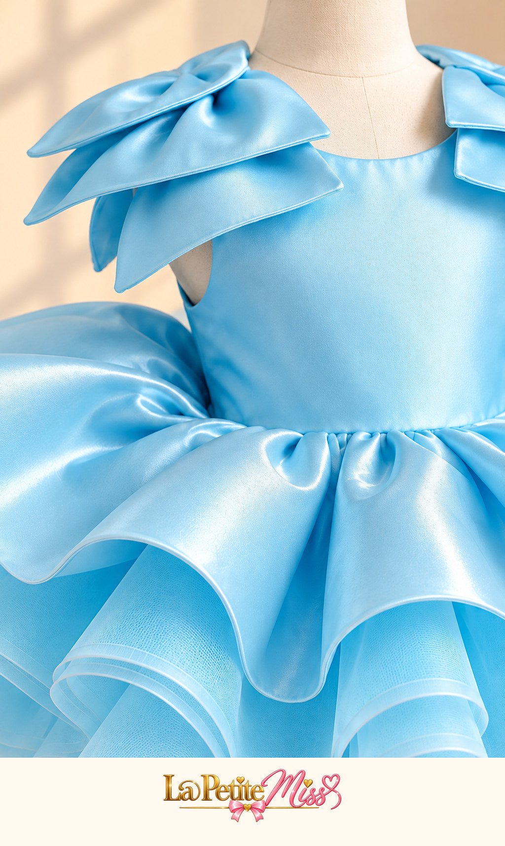 Highness Dress by La Petite Miss, close-up of the sky blue satin bodice and ruffles
