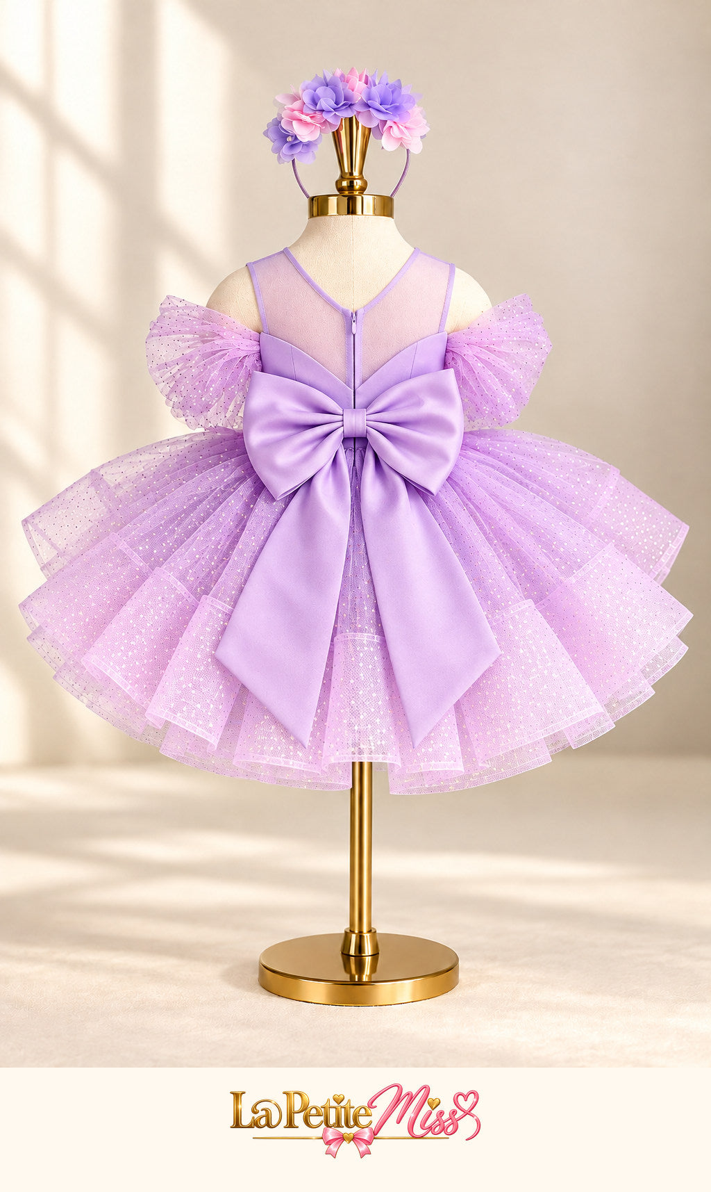Marquise Dress by La Petite Miss, back view of the lavender girls princess dress with bow